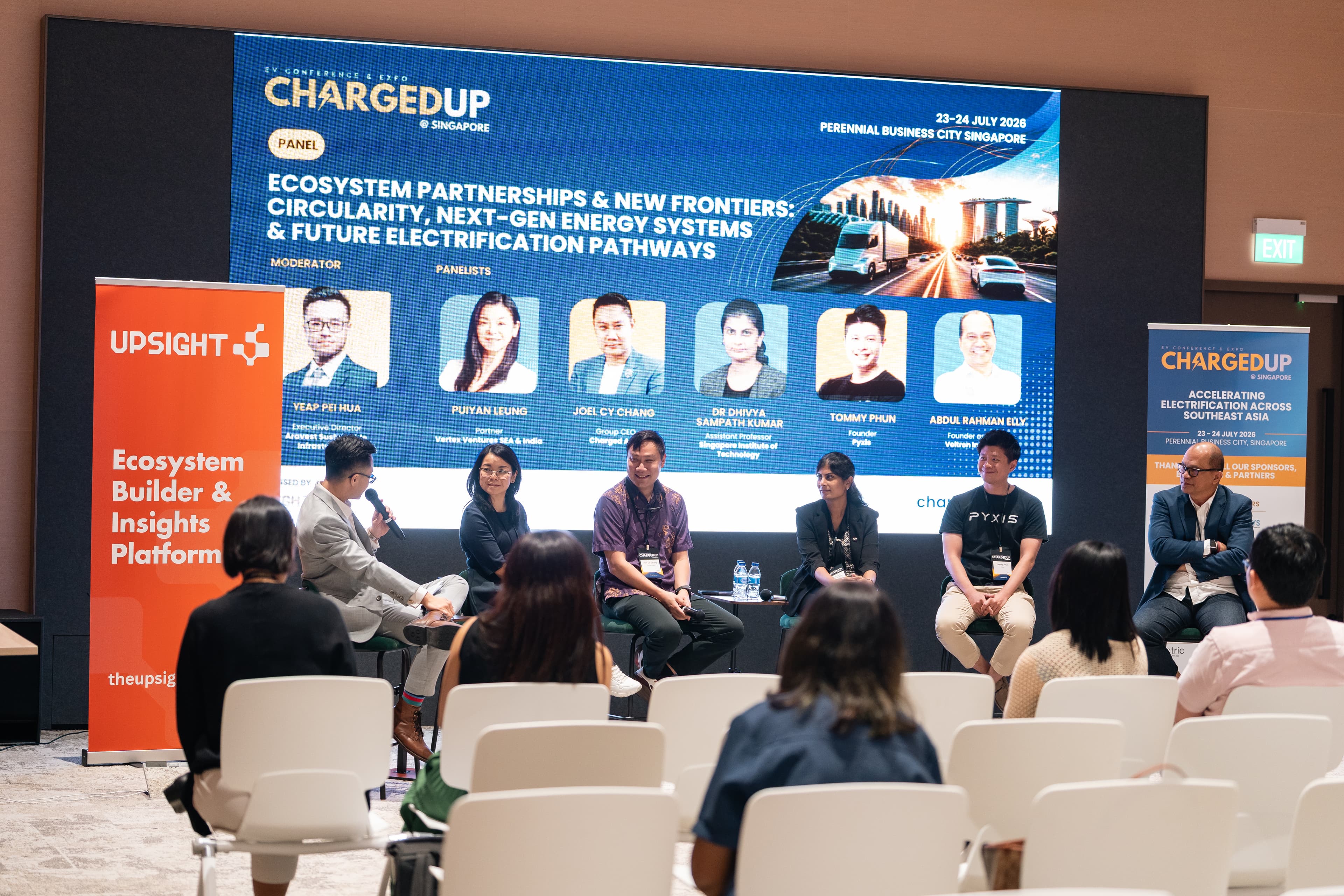 Pei Hua Yeap moderating a panel discussion at ChargedUp@SG 2026 in Singapore.